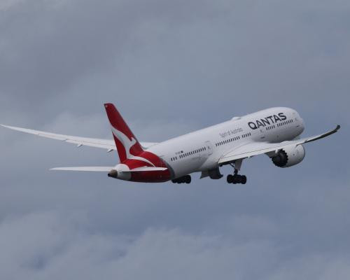 Passenger detained and banned from Qantas after allegedly biting attendant on flight from Australia to US